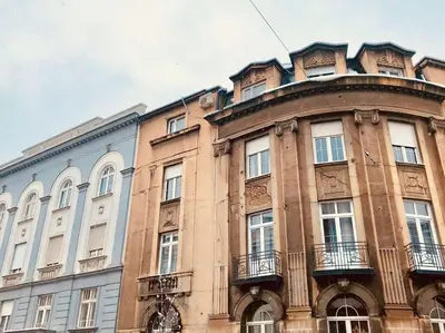 a large brick building with a round top at Luxury Apartments Donostia & Iruña in Belgrade