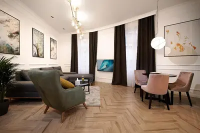 a living room with a couch and a table at Luxury Apartments Donostia & Iruña in Belgrade