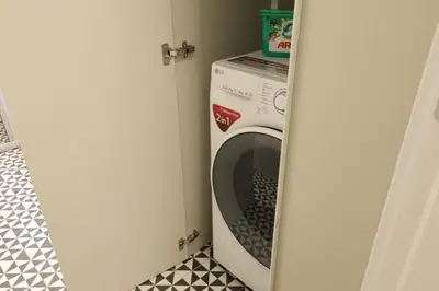 a washer and dryer in a laundry room at Belgrade Center Apartment VI in Belgrade