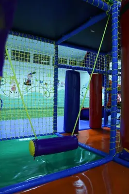 a gym with a ping pong ball and a net at Kengur Resort in Belgrade