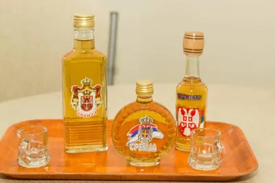 two bottles of whiskey and two glasses on a tray at See U in Belgrade in Belgrade