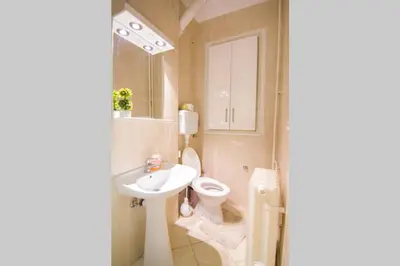 a bathroom with a toilet and a sink at See U in Belgrade in Belgrade