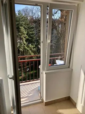 an open door with a view of a balcony at Modern Studio (Institut Majka i Dete) in Belgrade