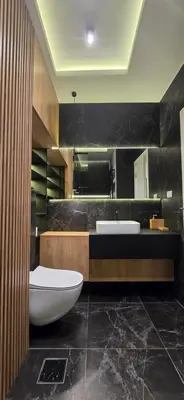 a large bathroom with a tub and a sink at Harmony Apartmani Arandjelovac in Arandjelovac