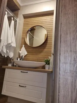 a bathroom with a sink and a mirror at Apartment Nusic residence in Belgrade