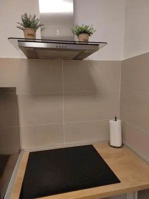 a room with a black yoga mat on the floor at Yellow Gate in Novi Grad