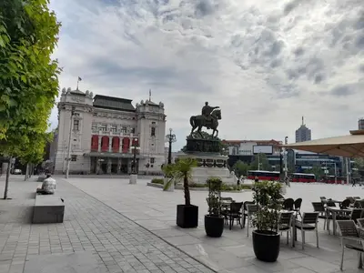 a statue of a man on a horse in front of a building at BUDGET Guest Room in Central Pedestrian Zone in Belgrade