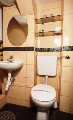a bathroom with a toilet and a sink at B&B Stadion in Belgrade