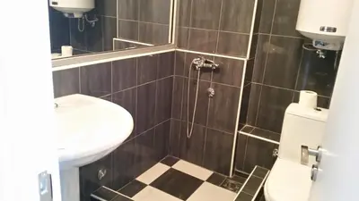 a bathroom with a toilet and a sink at B&B Stadion in Belgrade