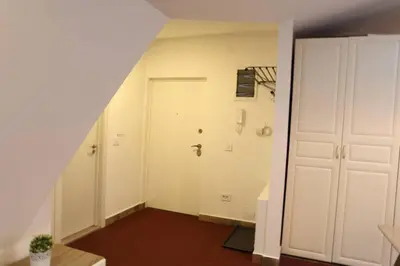 an empty room with a hallway with a door at Belgrade Center Apartment Nusiceva in Belgrade