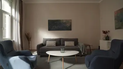 a living room with a couch and two chairs and a table at Yes Apartment, Belgrade Center in Belgrade