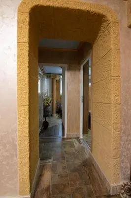 a hallway with an archway in a building at Top Spot apartment in Belgrade