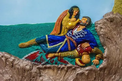 a painting of a man laying on the ground at Top Spot apartment in Belgrade