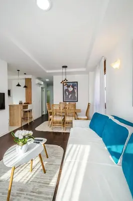 a living room with a couch and a table at A blok New Belgrade 2BD in Bežanija