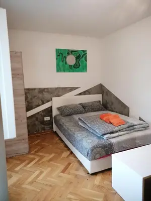 a bedroom with a bed in a room at Natasa in Zvezdara