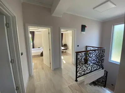 a hallway with a staircase in a home at Vila Eleonora Beograd in Belgrade