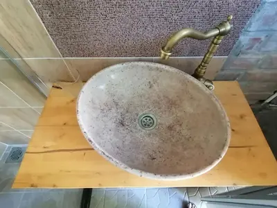 a sink on a wooden table in a bathroom at VisitorsCenter Ivanovo in Ivanovo