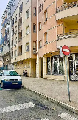 a car parked on a street in front of a building at Belgradian 011 in Belgrade