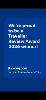 a blue screen with the words were proud to be a travelled reviewagencyagency at Vila POGLED in Arandjelovac