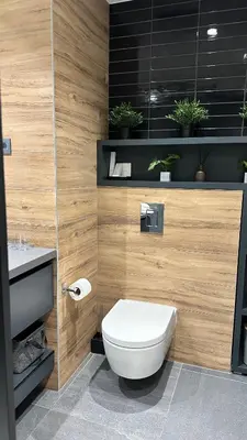 a bathroom with a toilet and a sink at DOM Boutique Apartments PARK VIEW in Belgrade
