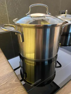 a large pot sitting on top of a stove at DOM Boutique Apartments PARK VIEW in Belgrade