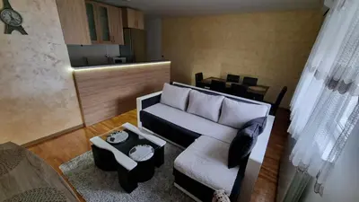 a living room with a couch and a table at Raven2 in Železnik