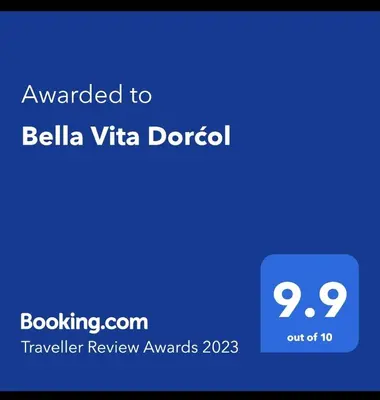 a screenshot of a cell phone with the text awarded to bellia vita d at Bella Vita Dorćol in Belgrade