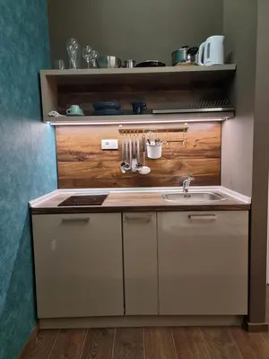 a kitchen with a sink and a counter at East & West Apartments in Belgrade