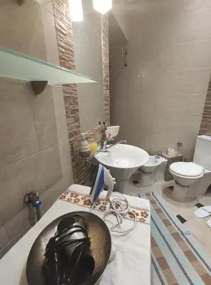 a bathroom with a sink and a toilet at Skorpion in Belgrade