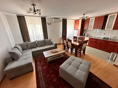 a living room with a couch and a table at Helena apartment in Belgrade