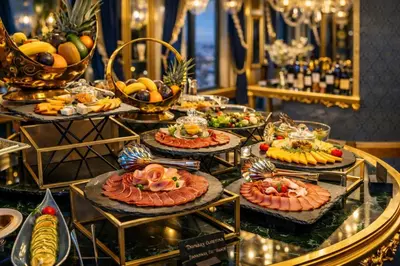 a buffet with many plates of food on a table at Prezident Palace Belgrade - Luxury Boutique Hotel & Spa in Belgrade