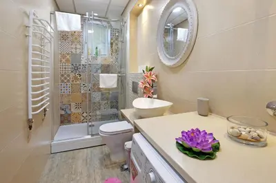 a bathroom with a toilet and a sink and a shower at Paradise Starry Suite-City center Belgrade in Belgrade