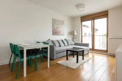 a living room with a couch and a table at Zemun Luxury - Comfortable, workspace, quiet, free parking, Netflix in Belgrade