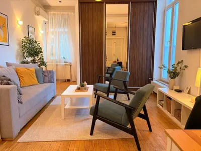 a living room with a couch and chairs at City Break Apartments Chic and Luxury in Belgrade