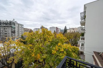 a view from a balcony of a city with buildings at Belgrade Center Apartment Lux III in Belgrade