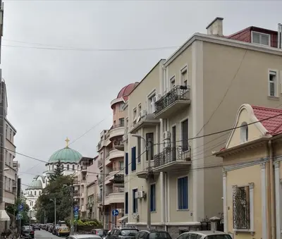 a row of buildings on a city street at Bibi's apartment in Belgrade