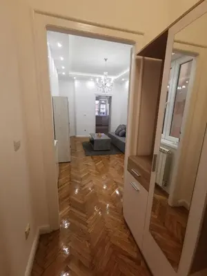 a view of a living room from the hallway at Victory apartment - Heart of Belgrade in Belgrade