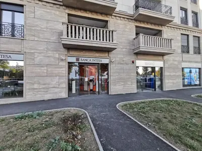 a building with two entrances to a mall at Victory apartment - Heart of Belgrade in Belgrade
