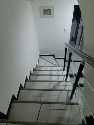 a stairway in a building with a stair case at Viktoria brdo in Žarkovo