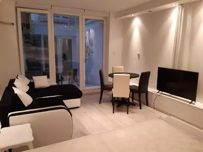a living room with a couch and a table at Viktoria brdo in Žarkovo