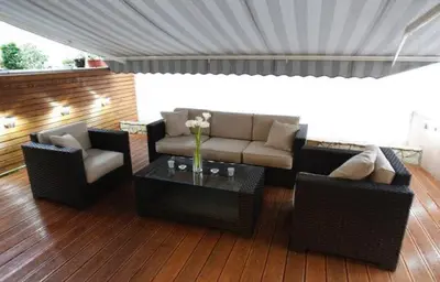 a living room with a couch and chairs and a table at Babilon in Vračar (historical)