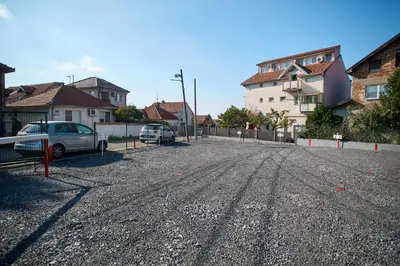 a parking lot with a car parked on the street at Villa ARS in Belgrade