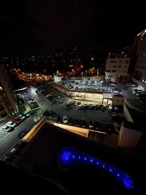 a view of a parking lot at night at Paunov Breg in Jajinci