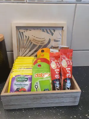 a wooden box filled with different types of snacks at Top Secret in Arandjelovac