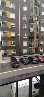 a group of cars parked in front of a building at MoonZe Gate in Belgrade