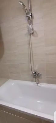 a shower in a bathroom with a white bath tub at MoonZe Gate in Belgrade