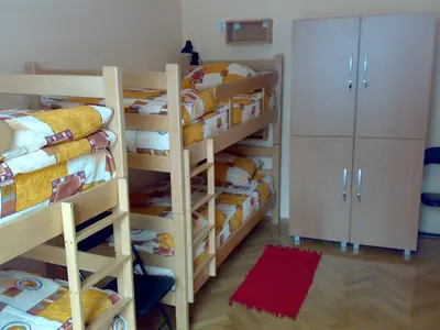 a room with four bunk beds in a room at Hostel M in Belgrade