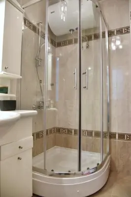a shower with a glass door in a bathroom at Apartment Carpe diem in Belgrade in Belgrade