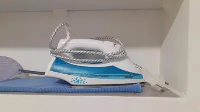 a hairbrush sitting on top of a pile of clothes at Iv Skadarlija in Belgrade