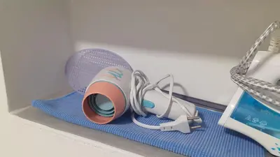 a pair of headphones and a microphone on a shelf at Iv Skadarlija in Belgrade